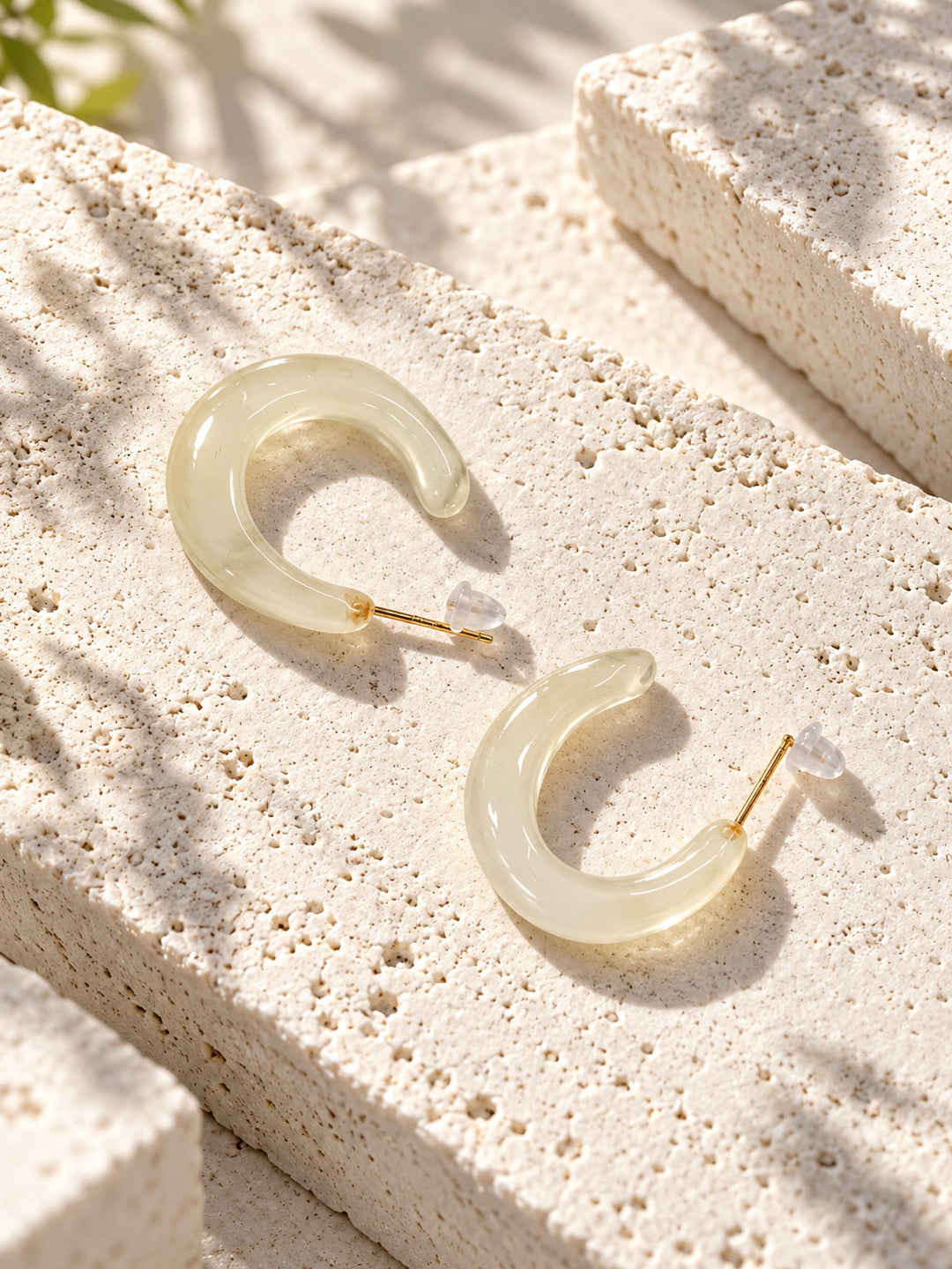 Niska ivory Resin hoop earrings on textured white stone