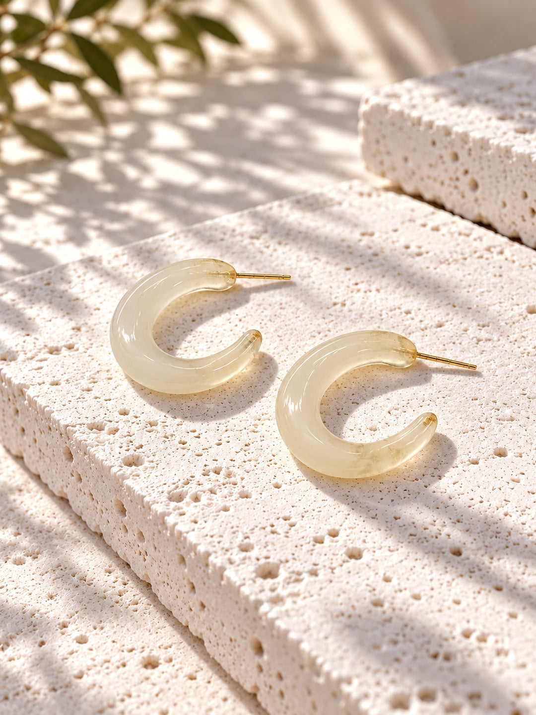 Niska ivory Resin hoop earrings on textured white stone