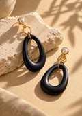 Black resin long earrings alternate pose