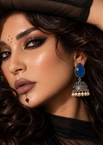 Monalisa blue stone oxidized jhumka earrings close-up model image