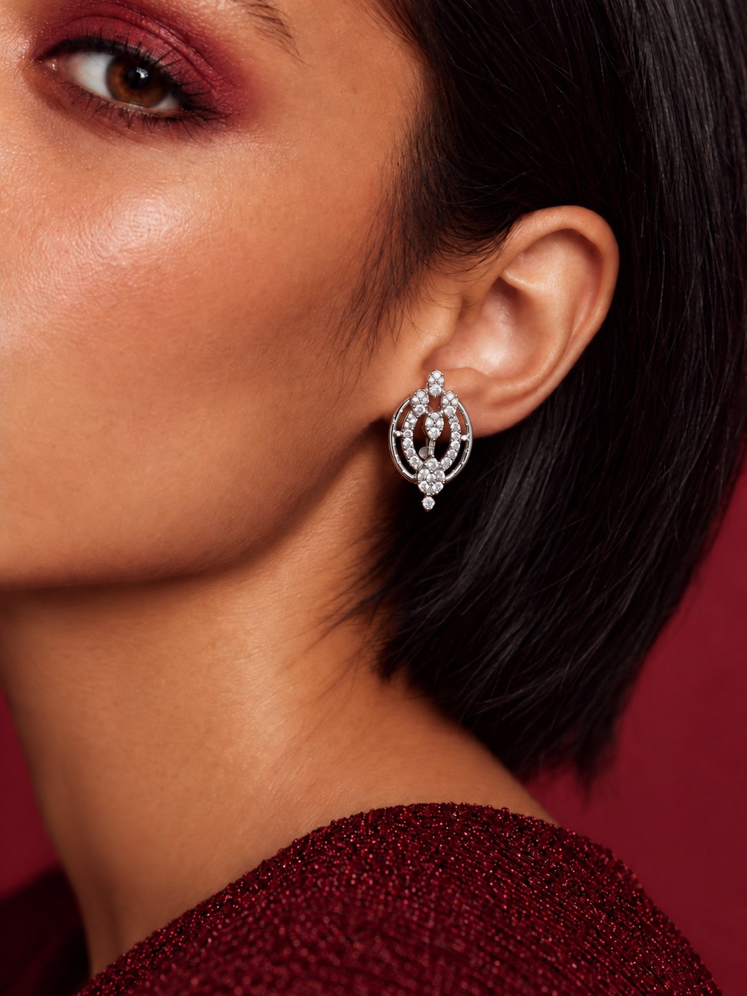 White AD Stone Silver Replica oval earrings worn by model