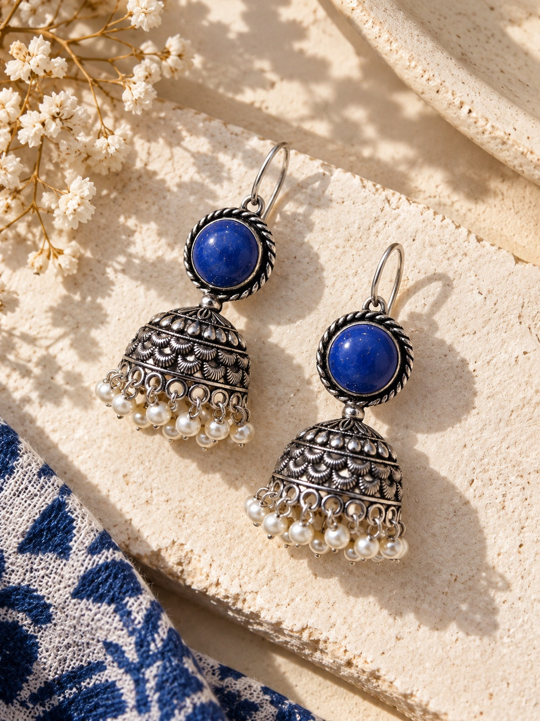 Monalisa blue stone oxidized silver jhumka earrings