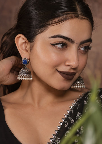 Monalisa blue stone oxidized silver jhumka earrings