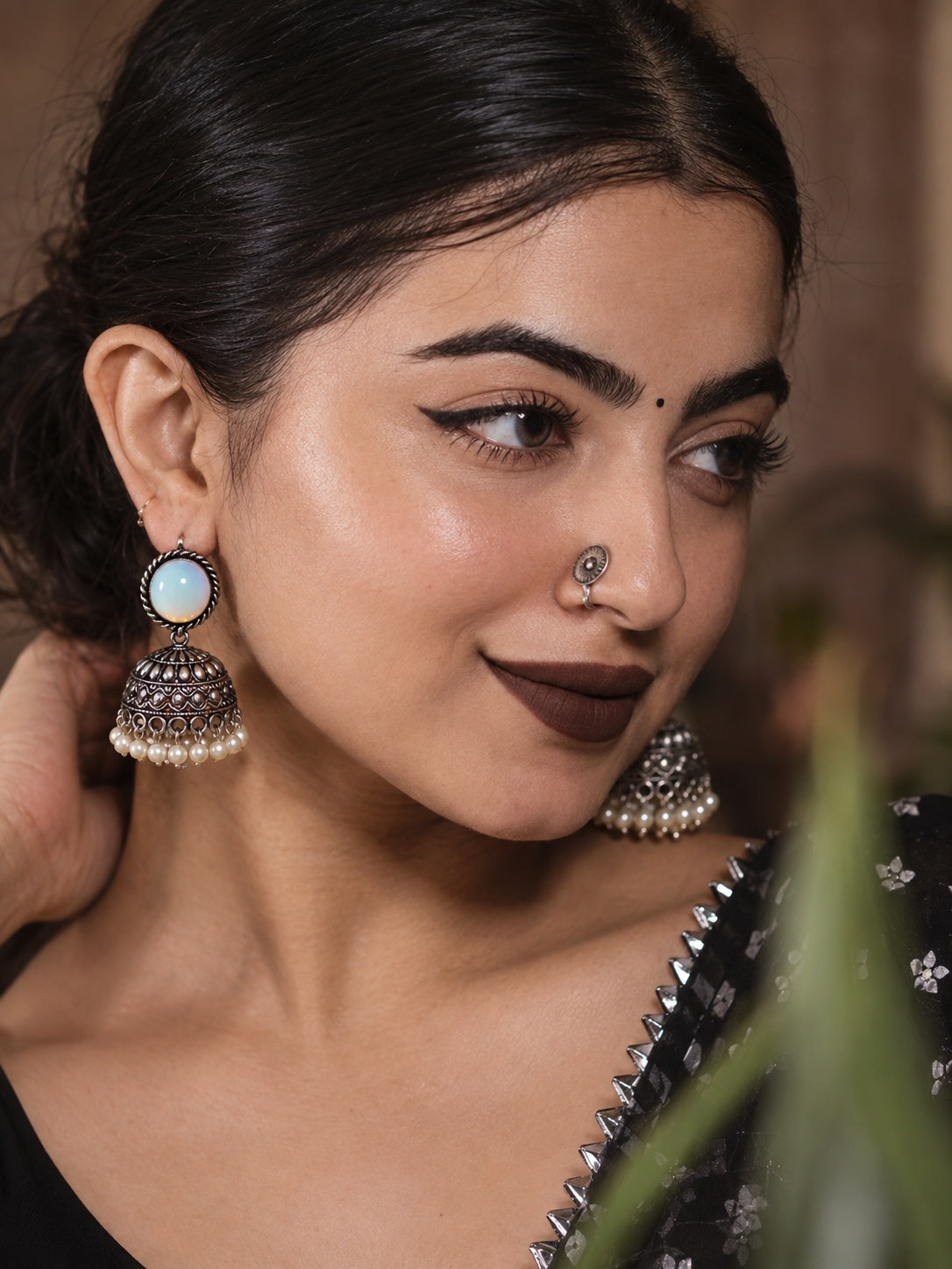 Monalisa oxidized silver jhumka model close-up
