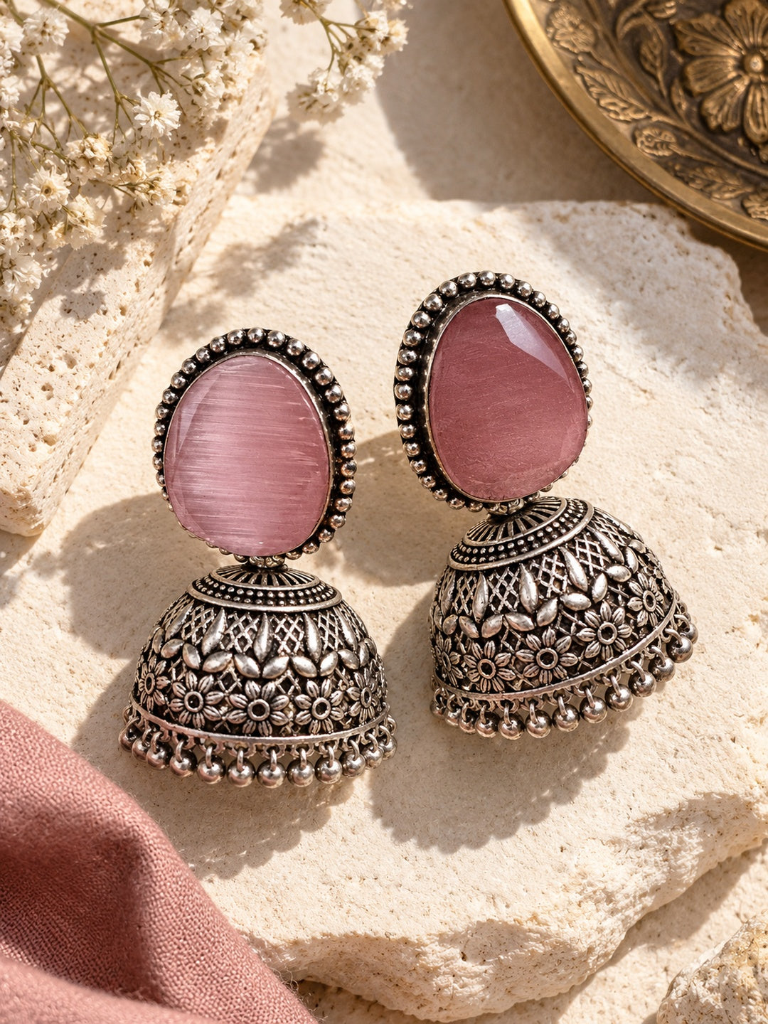Monalisa Stone Silver Replica Jhumka Earrings editorial flat shot