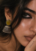 Monalisa Stone Silver replica jhumka worn by model
