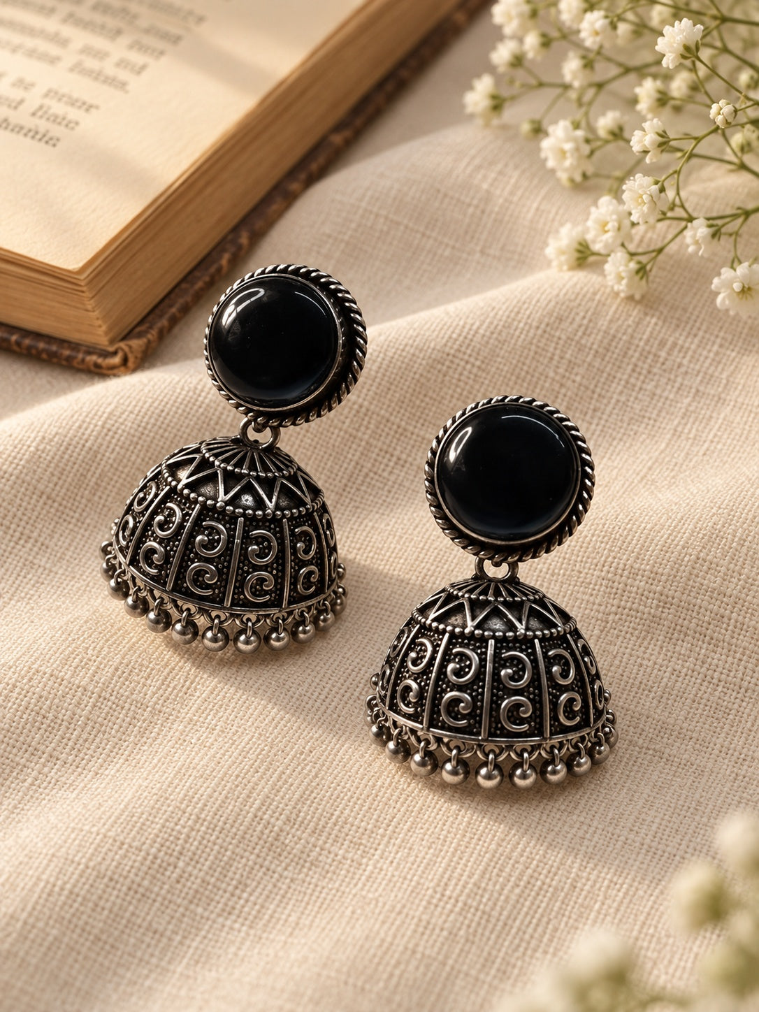 Black Monalisa Stone Silver replica jhumka earrings editorial view 2