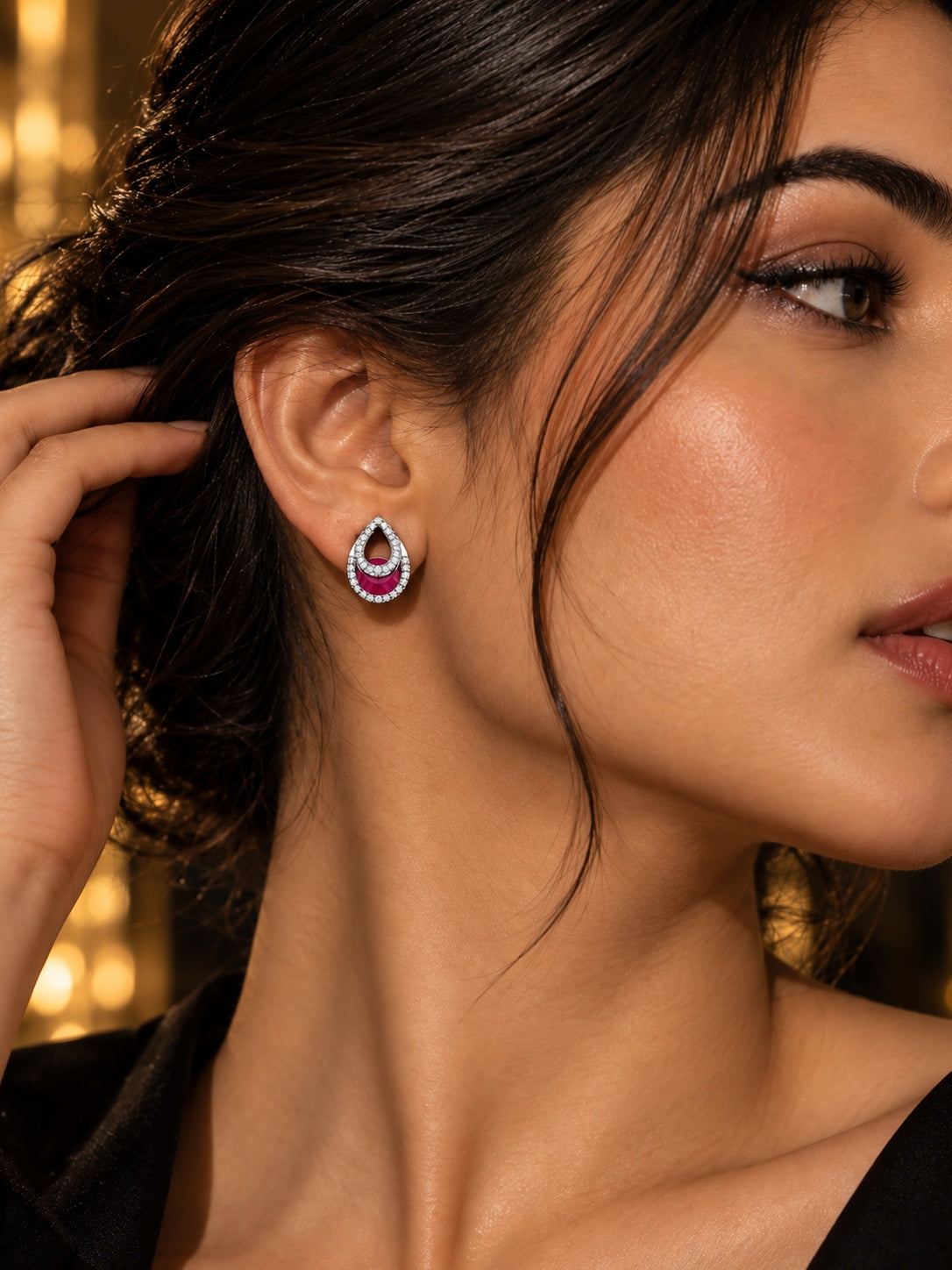 Niska ruby red AD Stone Silver replica teardrop earrings worn by model