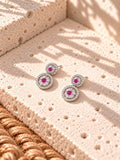 Niska AD Stone Silver replica pink floral drop earrings on white travertine