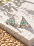 Mint green triangular AD Stone Silver replica earrings on white travertine
