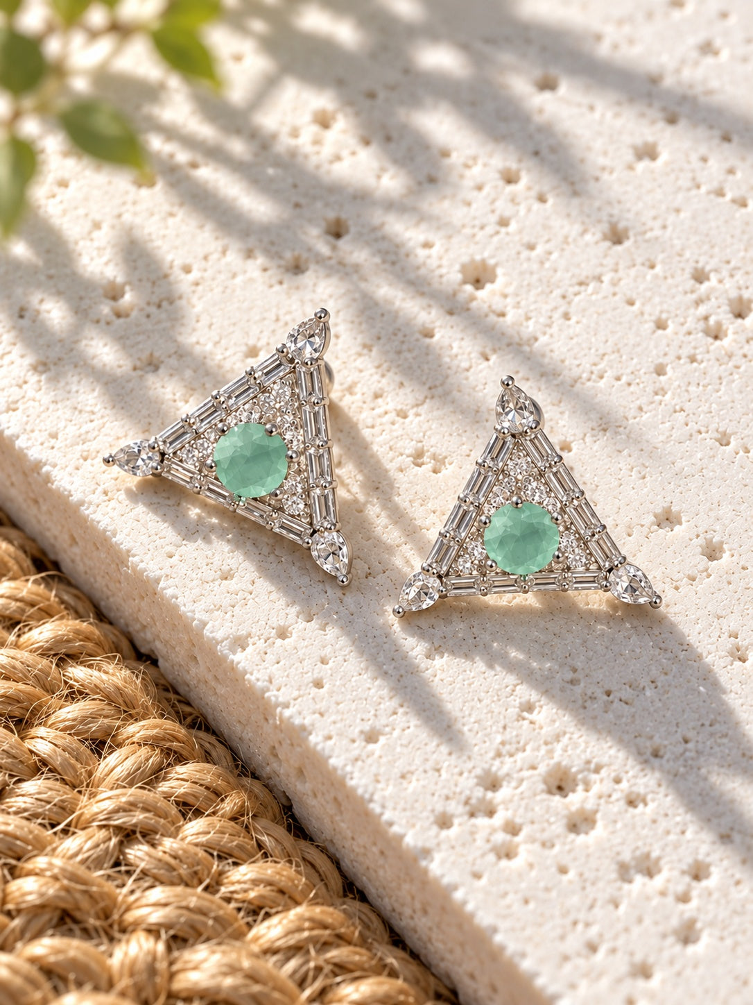 Mint green AD Stone triangular earrings elevated view