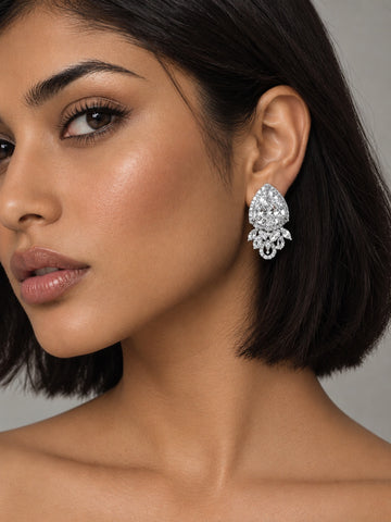 Model wearing NISKA silver replica AD stone statement earrings