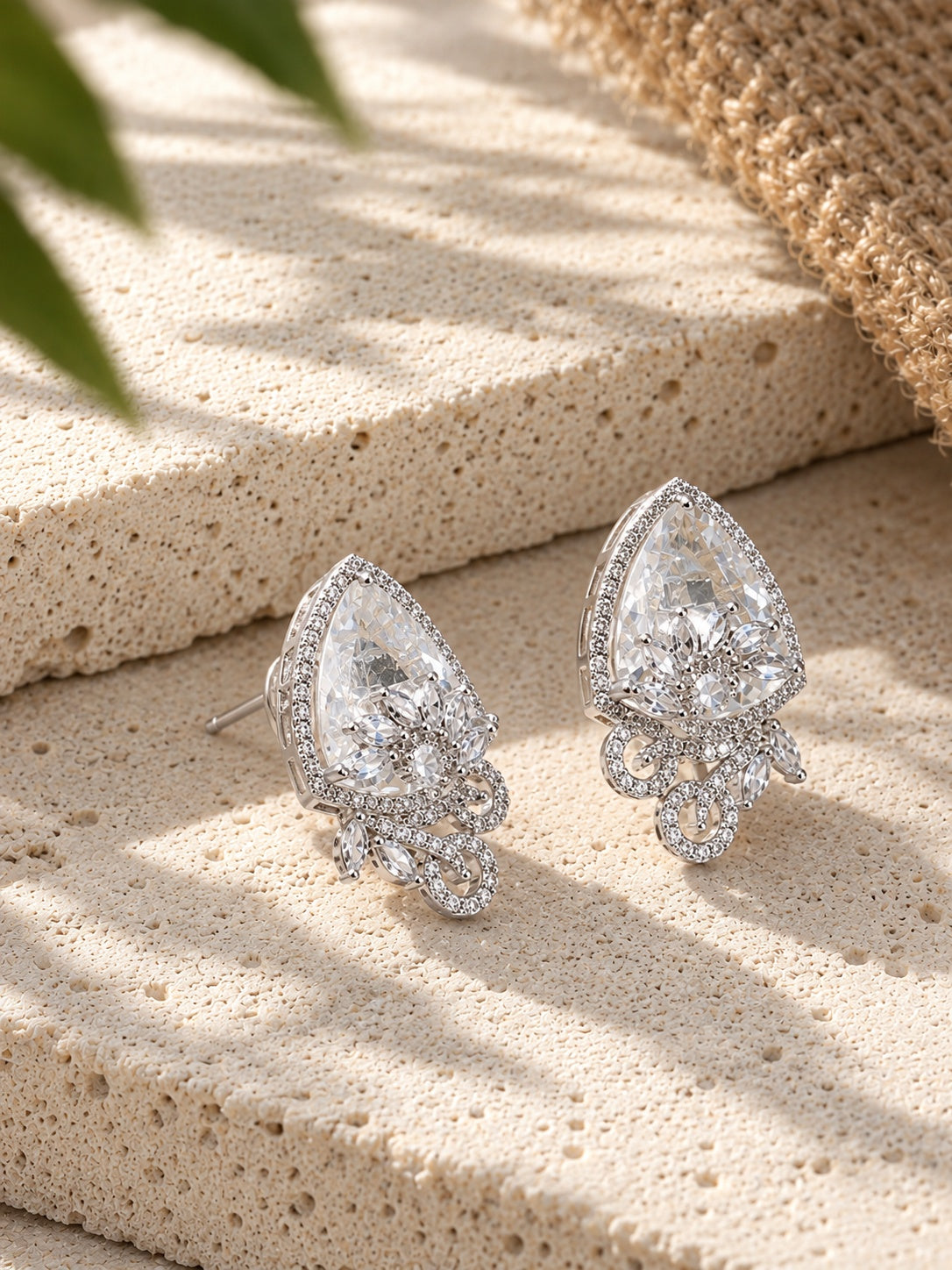 Silver replica AD stone earrings with jute styling