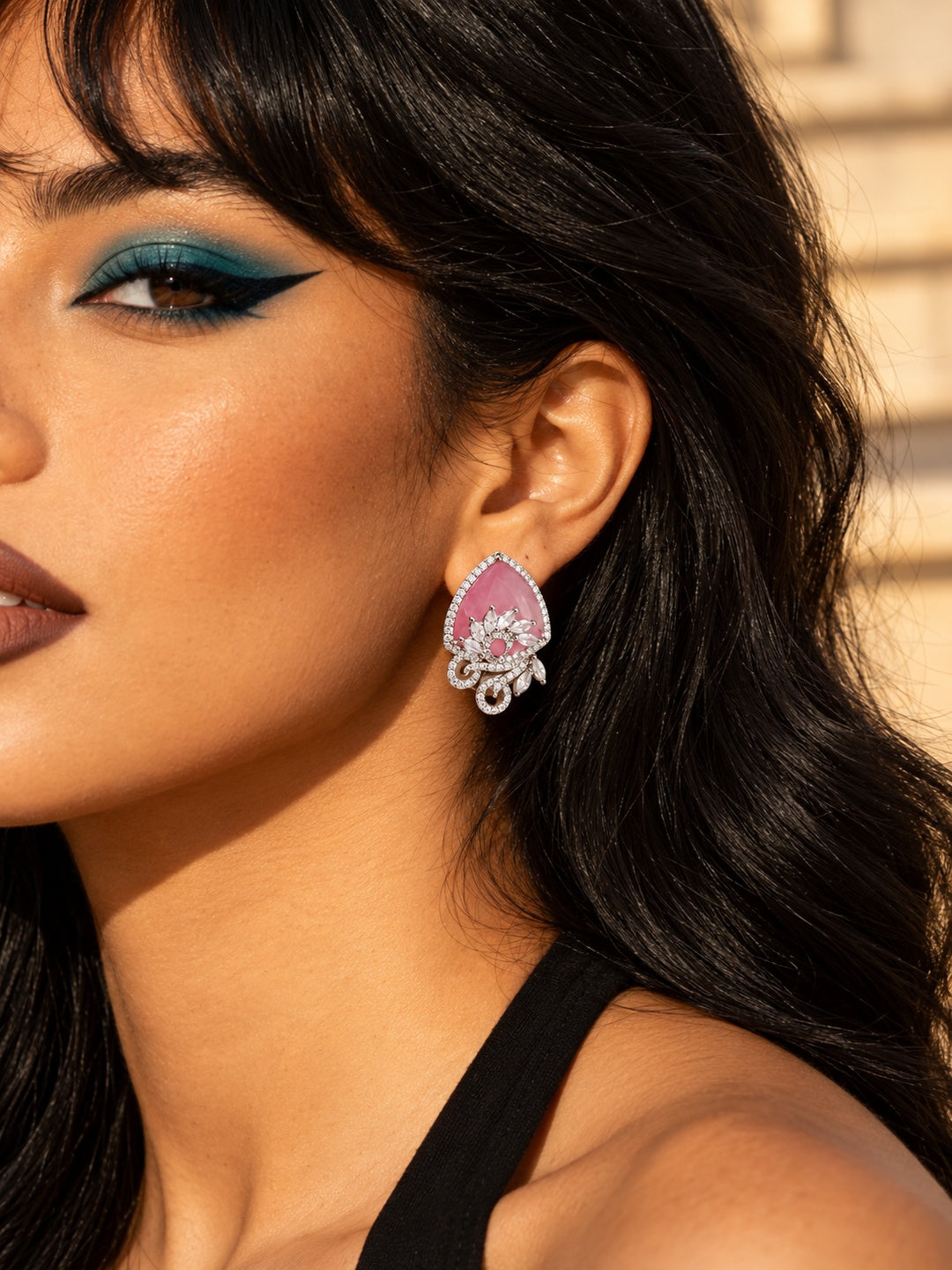 Niska pink AD Stone Silver replica earrings worn by a model
