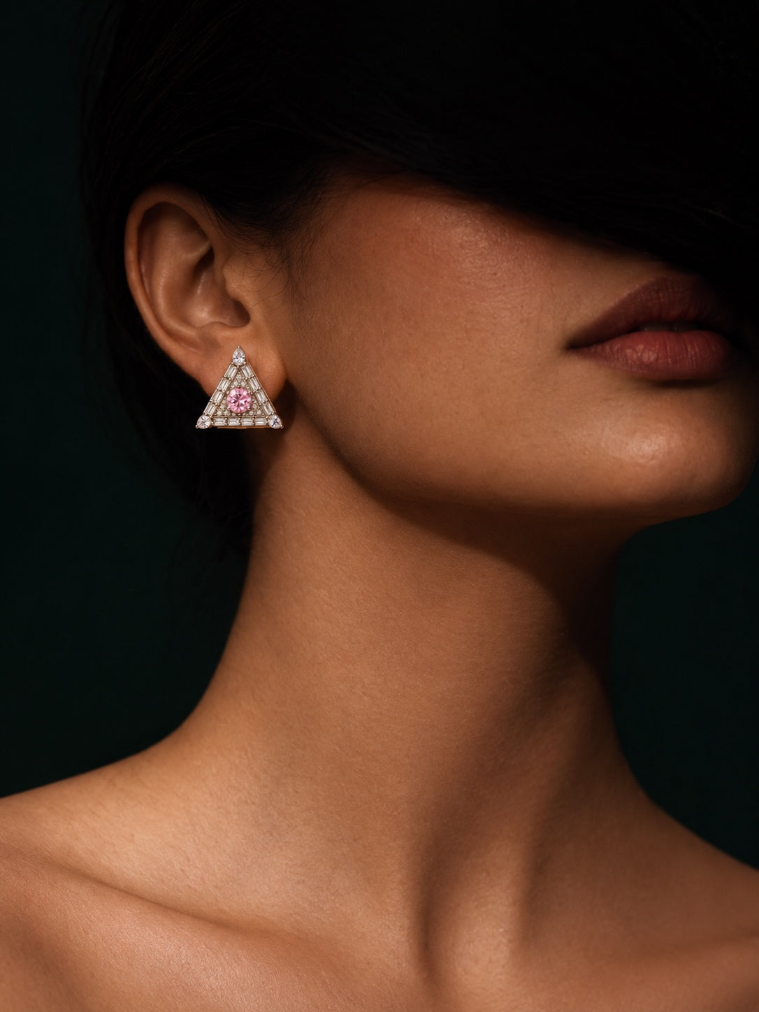 Baby pink triangular Silver replica AD Stone earrings worn by model
