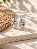 Niska Silver replica AD Stone leaf stud earrings on white travertine view 1