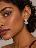 Baby pink AD Stone Silver replica earrings worn by model | Niska