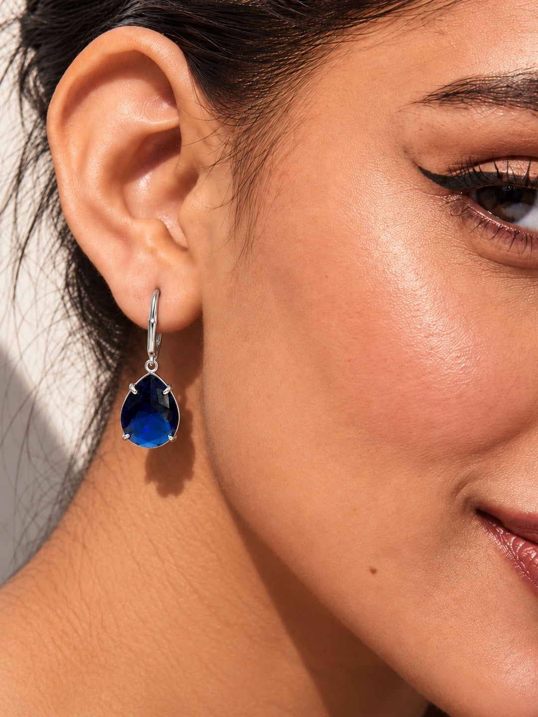 Niska blue teardrop AD Stone Silver replica earrings model close-up