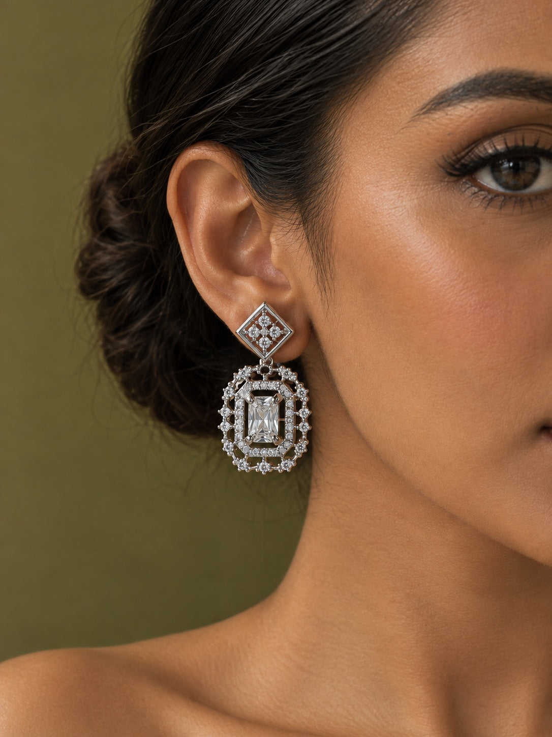Silver AD stone replica drop earrings worn by model