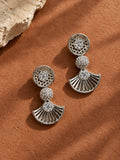 NISKA silver replica earrings on terracotta background
