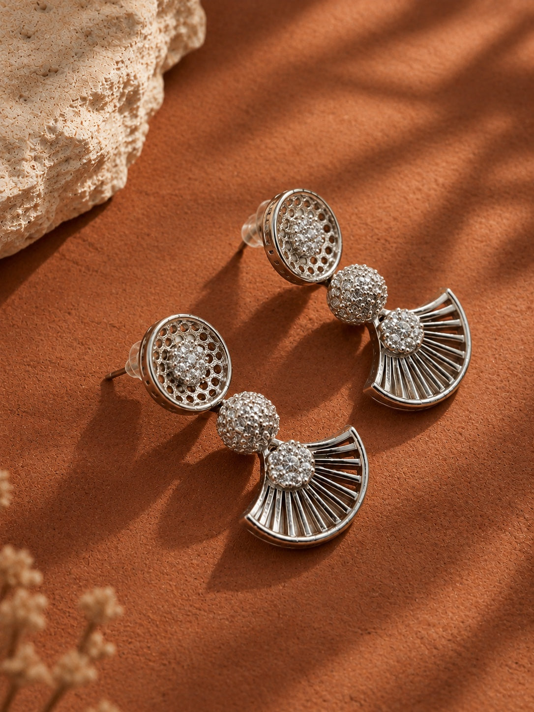 Close-up view of NISKA silver replica earrings