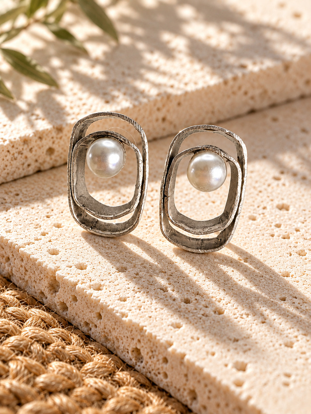 Niska silver replica pearl earrings, textured silver frames, product angle 3