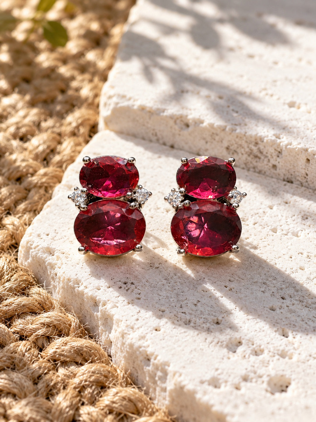 Niska ruby red AD Stone Silver Replica earrings worn by model, featured image
