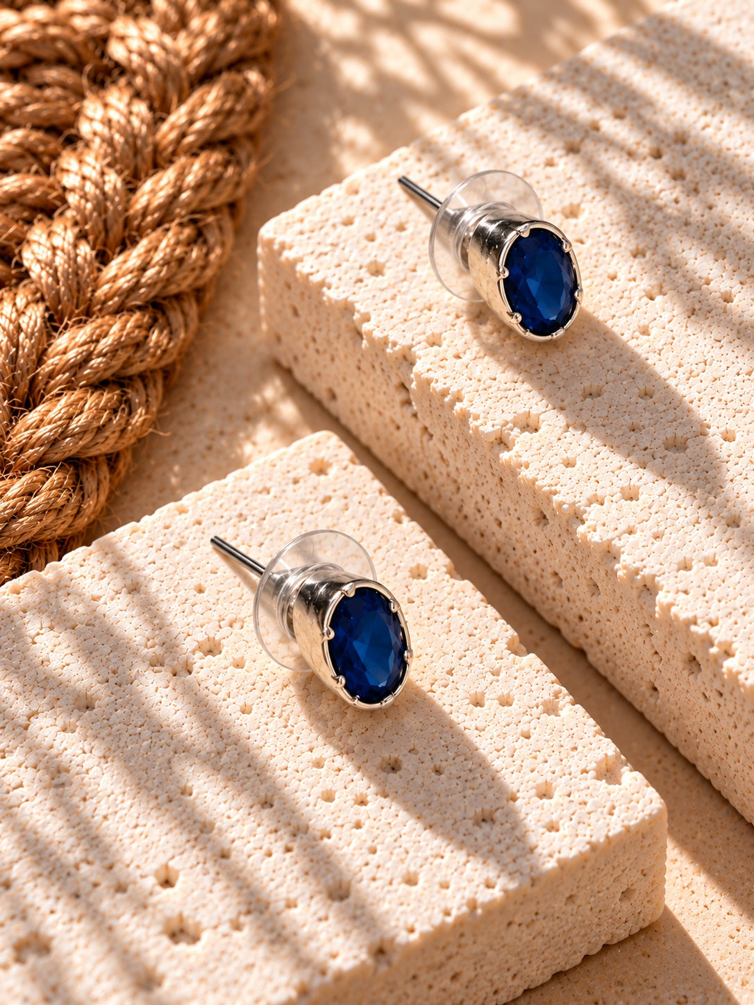 Niska navy blue oval AD Stone Silver Replica stud earring on model