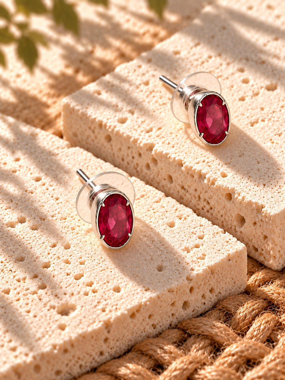 Niska red oval AD Stone Silver replica stud earrings worn on model