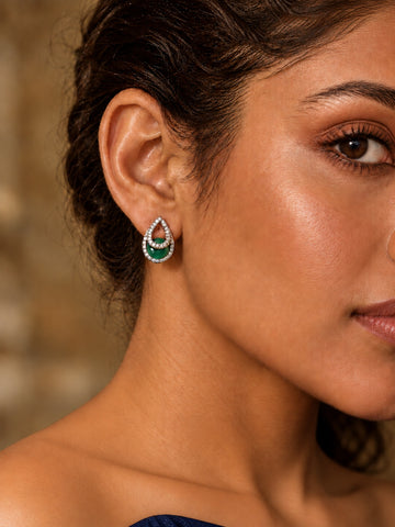 Niska green teardrop AD Stone Silver Replica earrings worn by a model