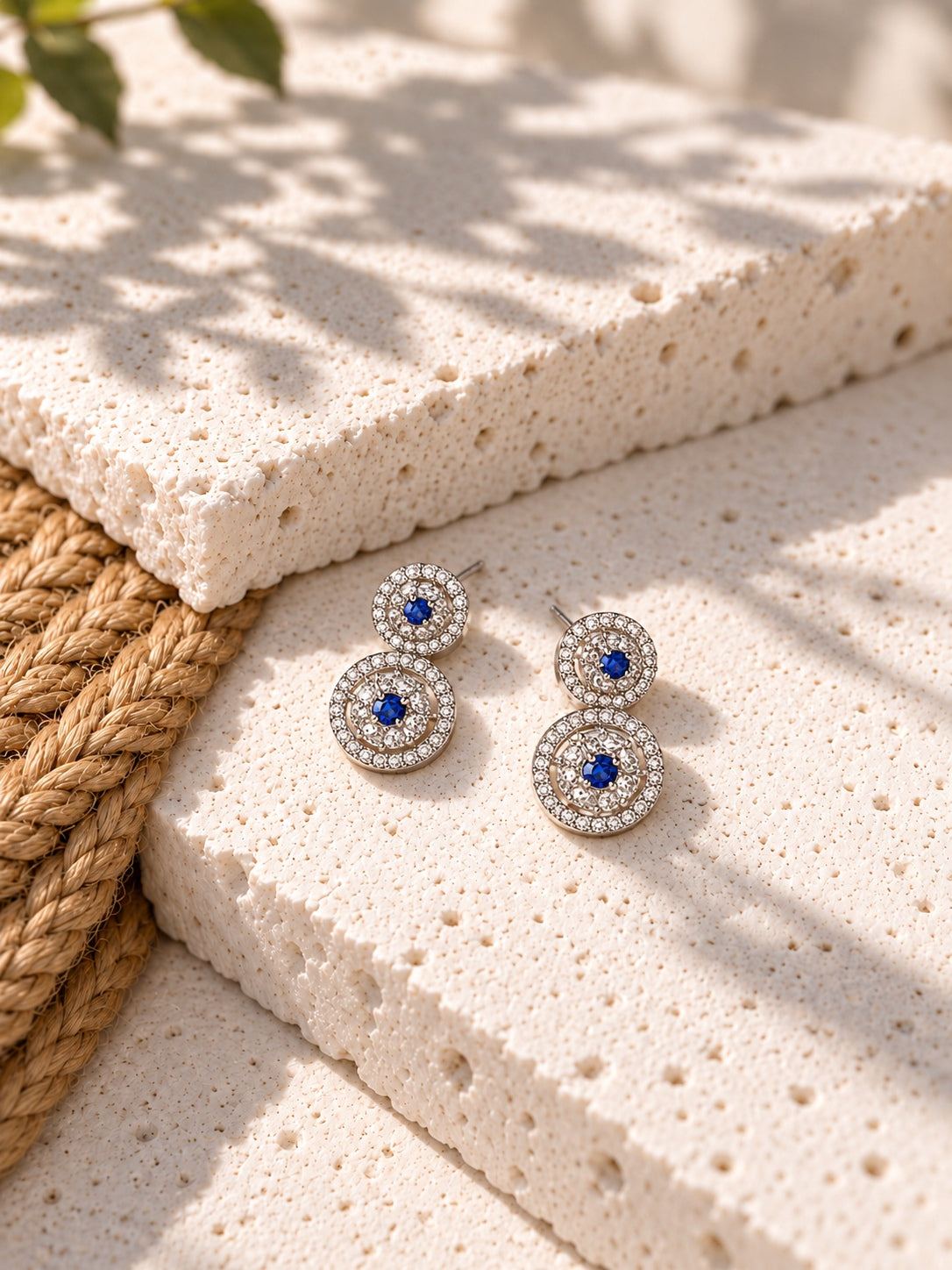 Niska blue AD Stone Silver replica drop earring worn by model