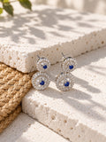 Niska blue AD Stone Silver replica earrings on travertine - view 6