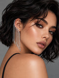 Niska Silver replica back ear chain tassel earring on model