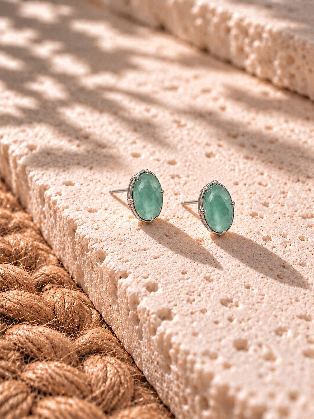 Niska sea green oval AD Stone Silver Replica stud earring worn by model