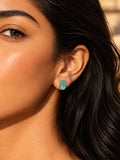 Niska sea green oval AD Stone Silver Replica stud earring worn by model