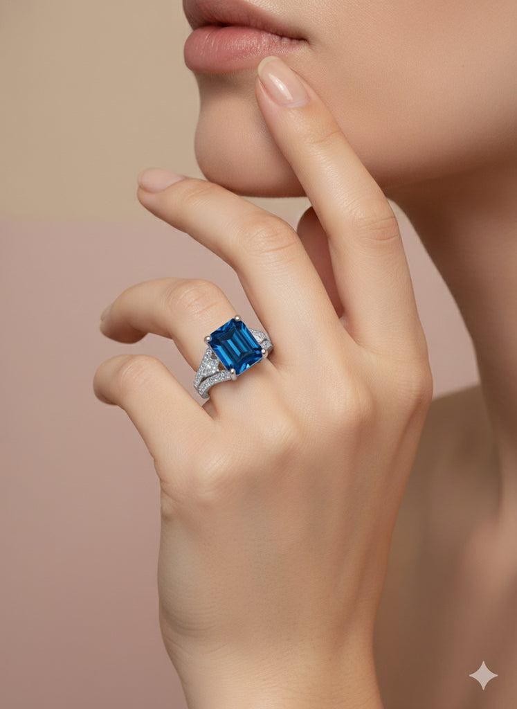 Niska Rhodium-Plated Stainless Steel Adjustable Ring with Emerald Blue Stone and Cubic Zirconia Detailing