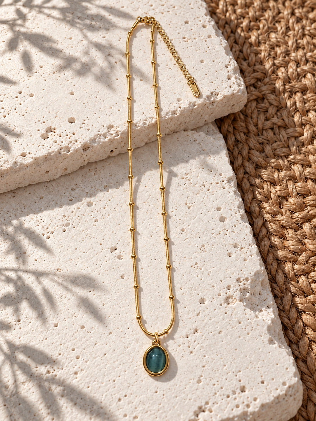 Niska green oval pendant gold-tone necklace detail