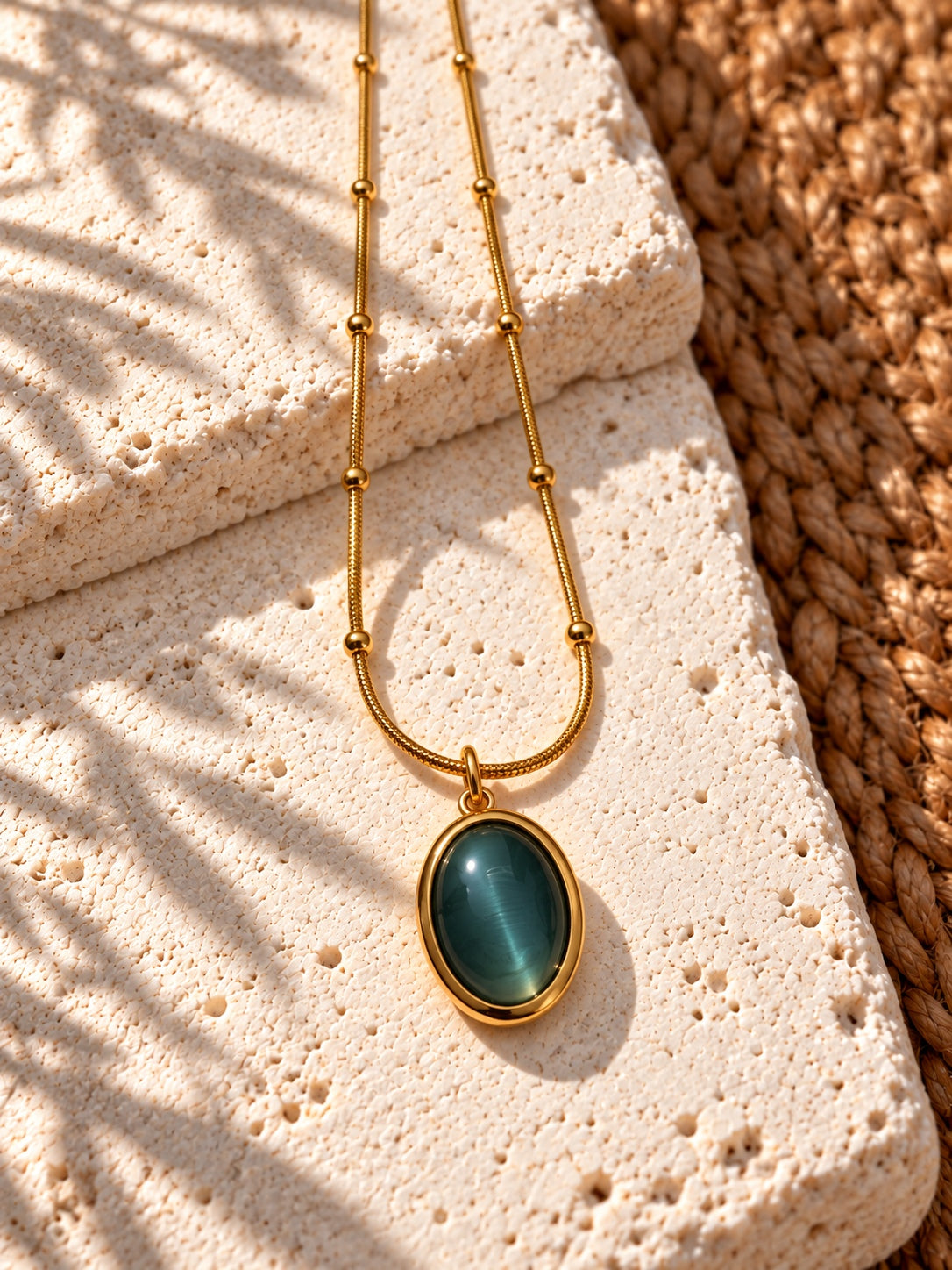Niska green oval pendant gold-tone necklace detail