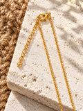 Niska gold-tone celestial oval replica necklace – clasp and extender detail