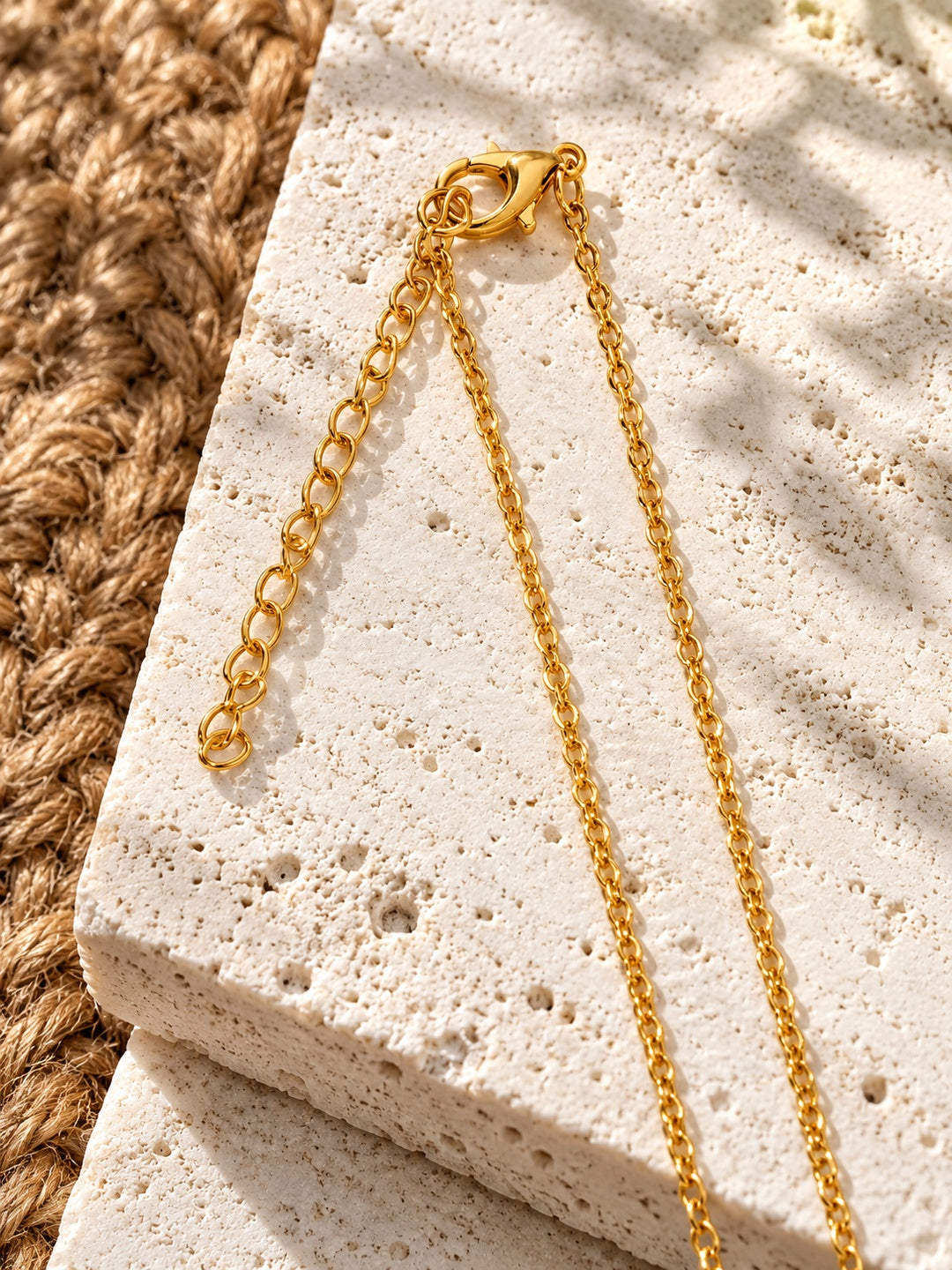 Niska gold-tone celestial oval replica necklace – clasp and extender detail