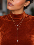 Niska gold-tone layered lariat replica necklace model close-up