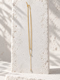 Niska gold-tone layered lariat replica necklace detail view