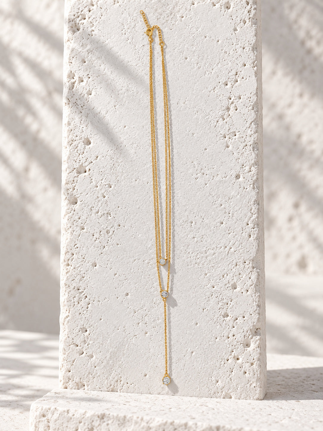 Niska gold-tone layered lariat replica necklace detail view