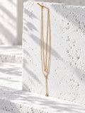 Niska gold-tone layered lariat replica necklace detail view