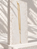 Niska gold-tone layered lariat replica necklace detail view