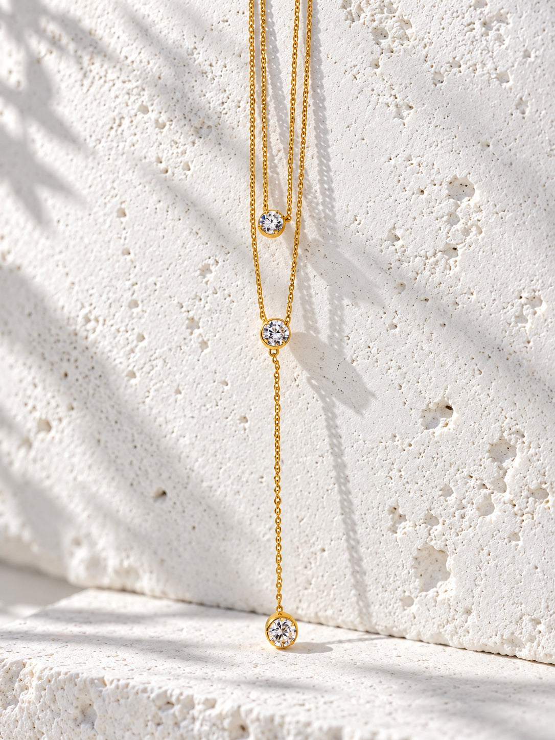 Niska gold-tone layered lariat replica necklace model close-up