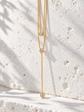 Niska gold-tone layered lariat replica necklace detail view