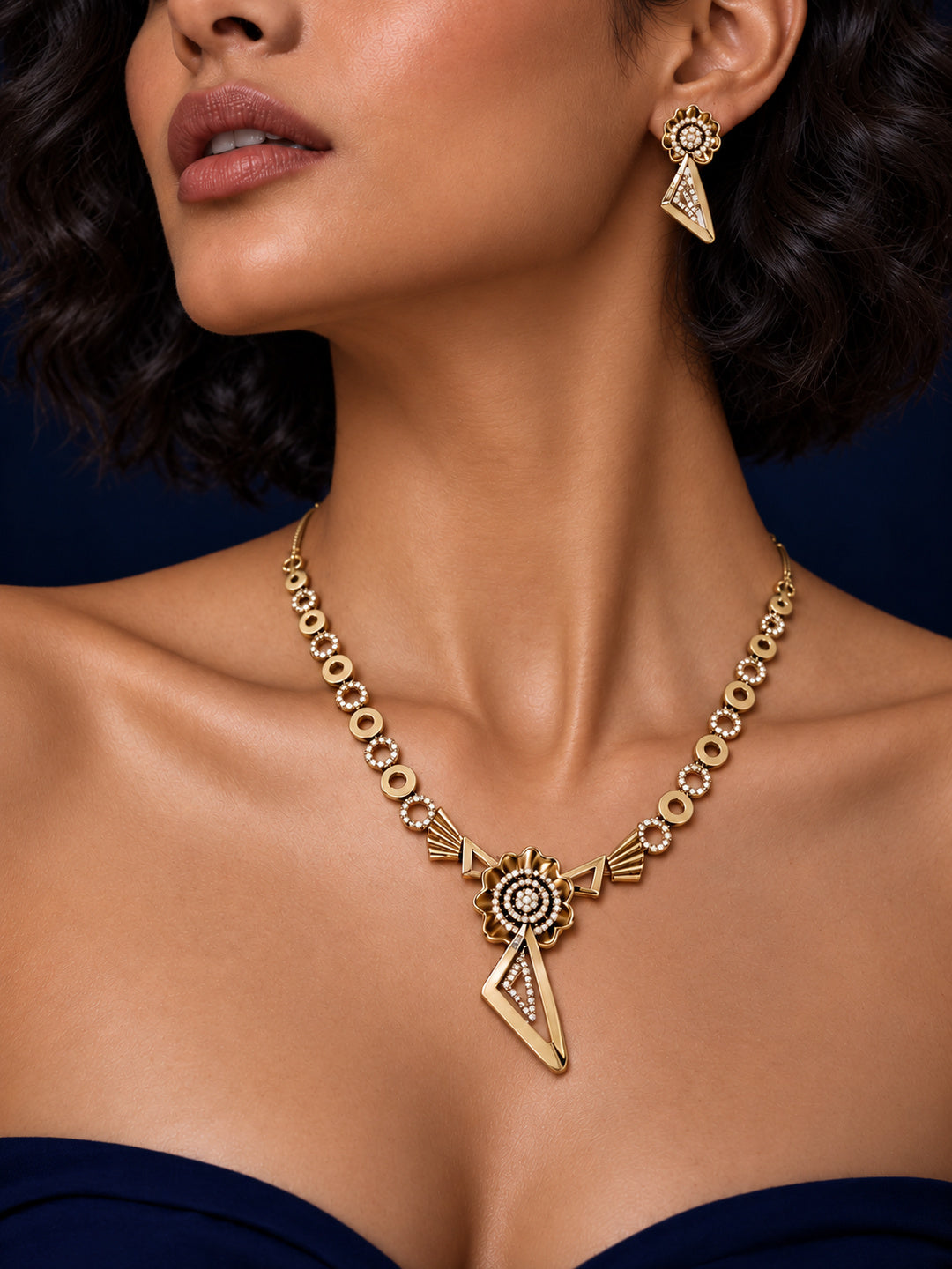 Niska floral geometric replica necklace set and matching earrings worn by a model