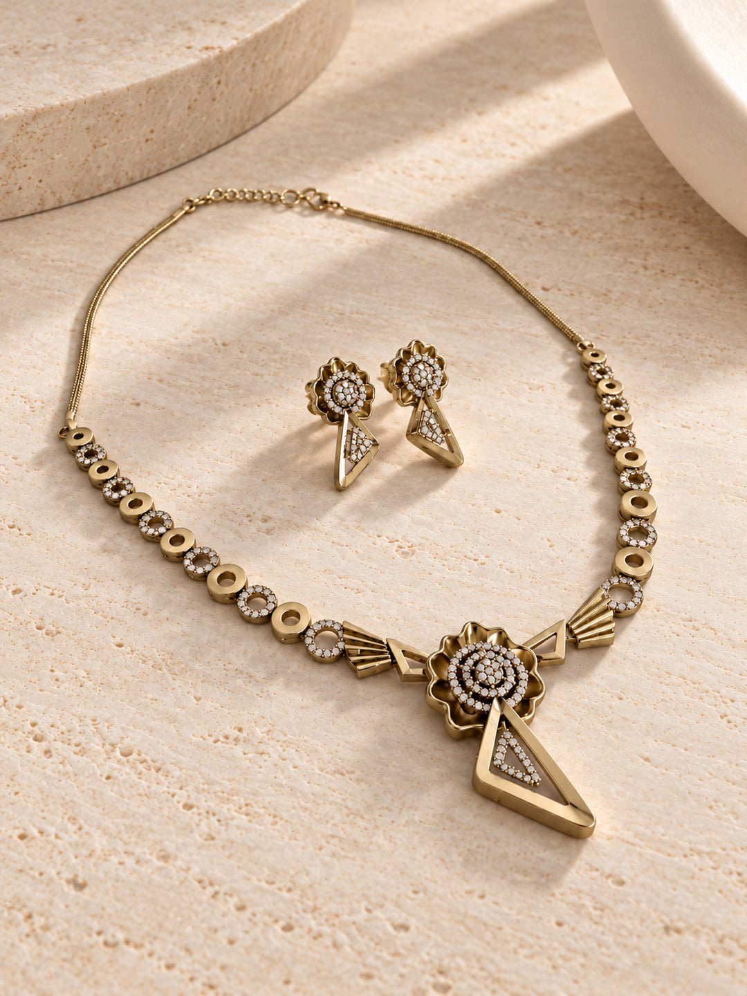 Niska floral geometric replica necklace set and matching earrings worn by a model