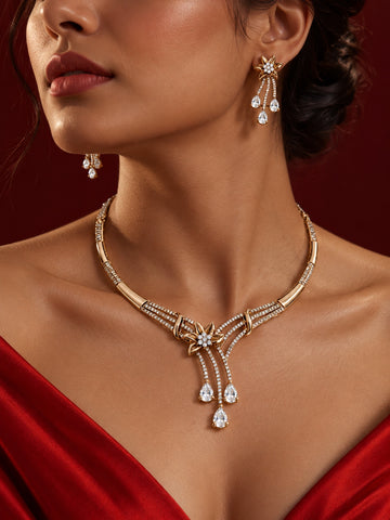 Niska floral AD stone necklace and matching earrings worn by a model